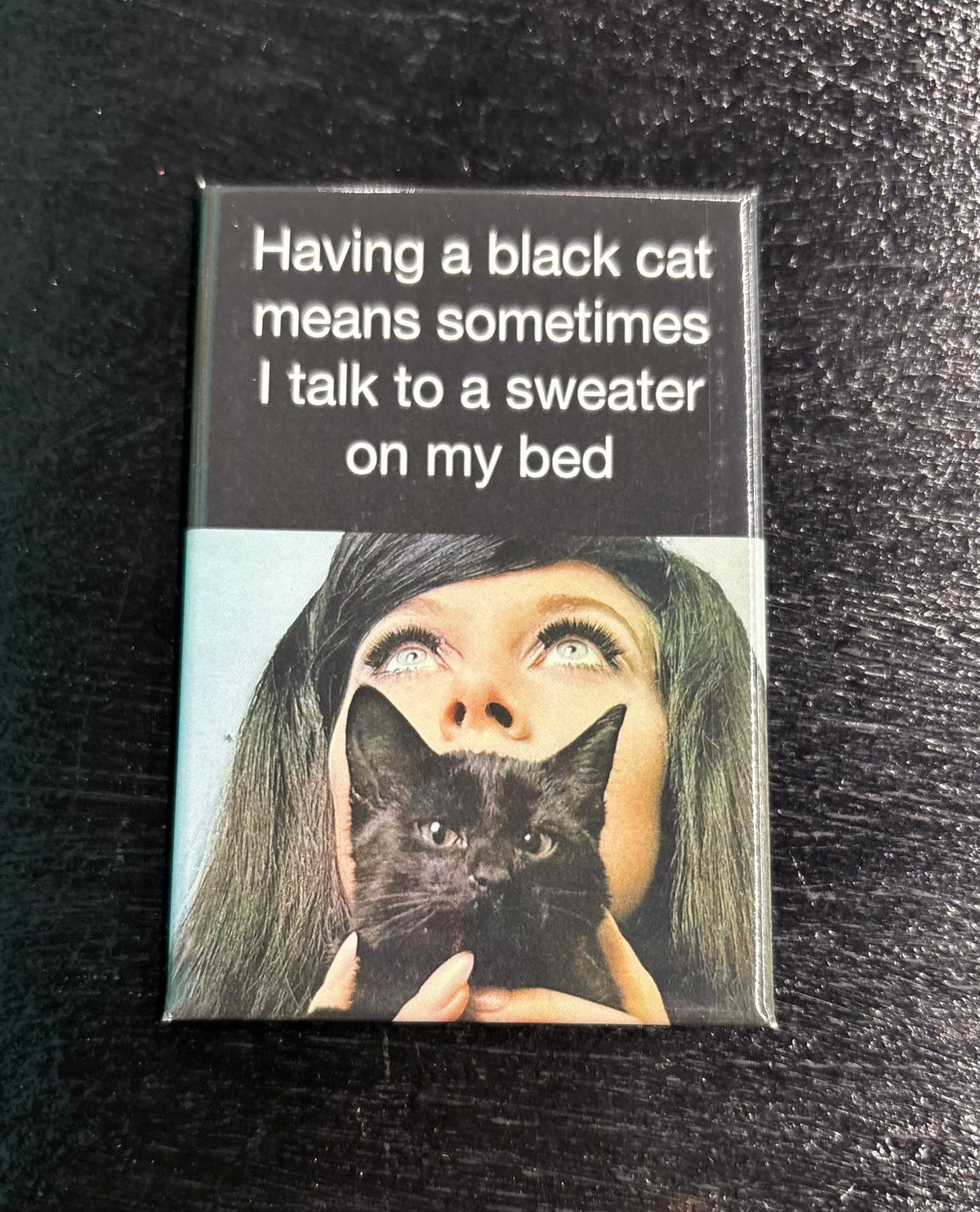 Having a black cat means... - Magnet