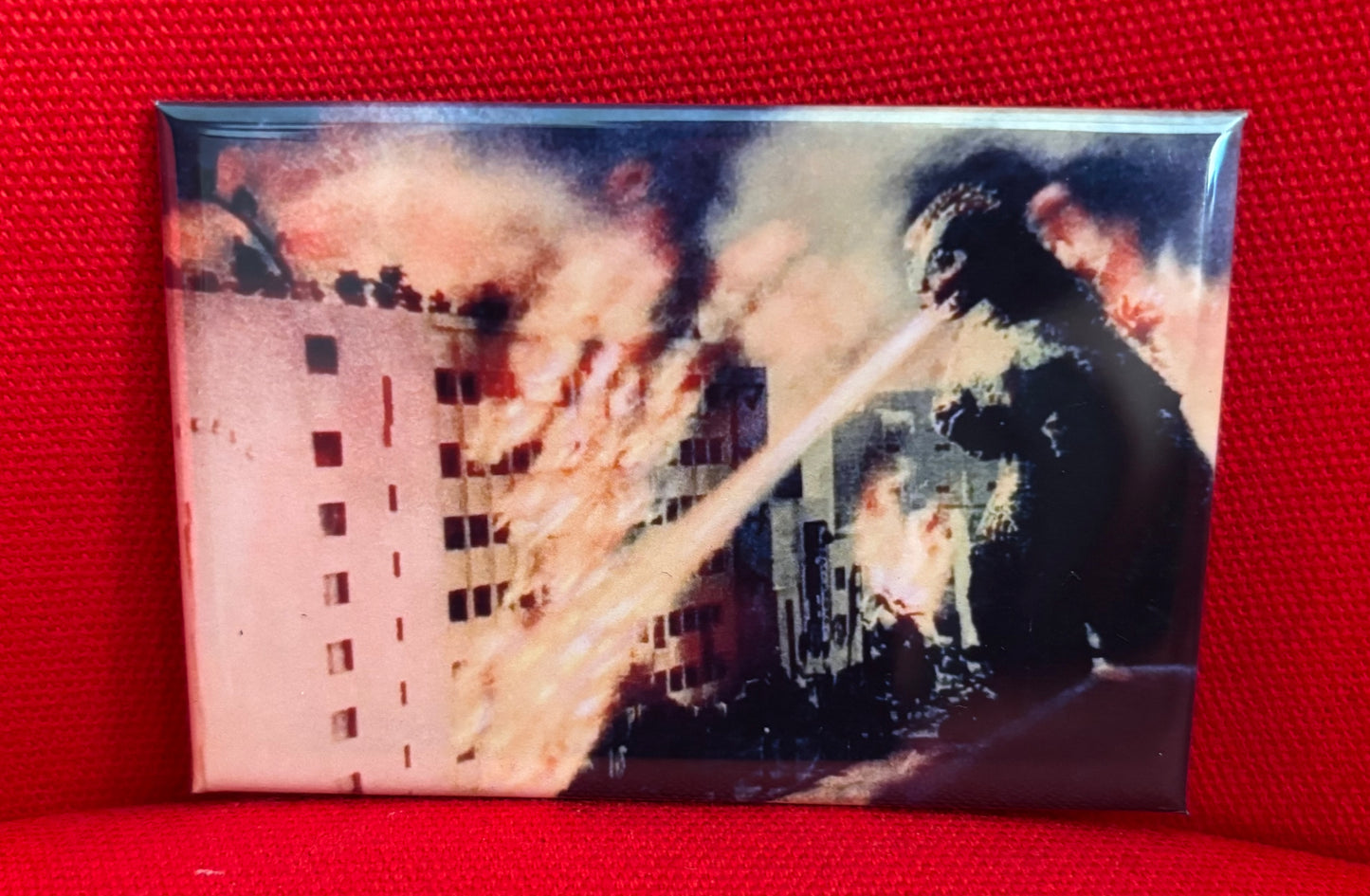 Godzilla, fire and buildings - magnet